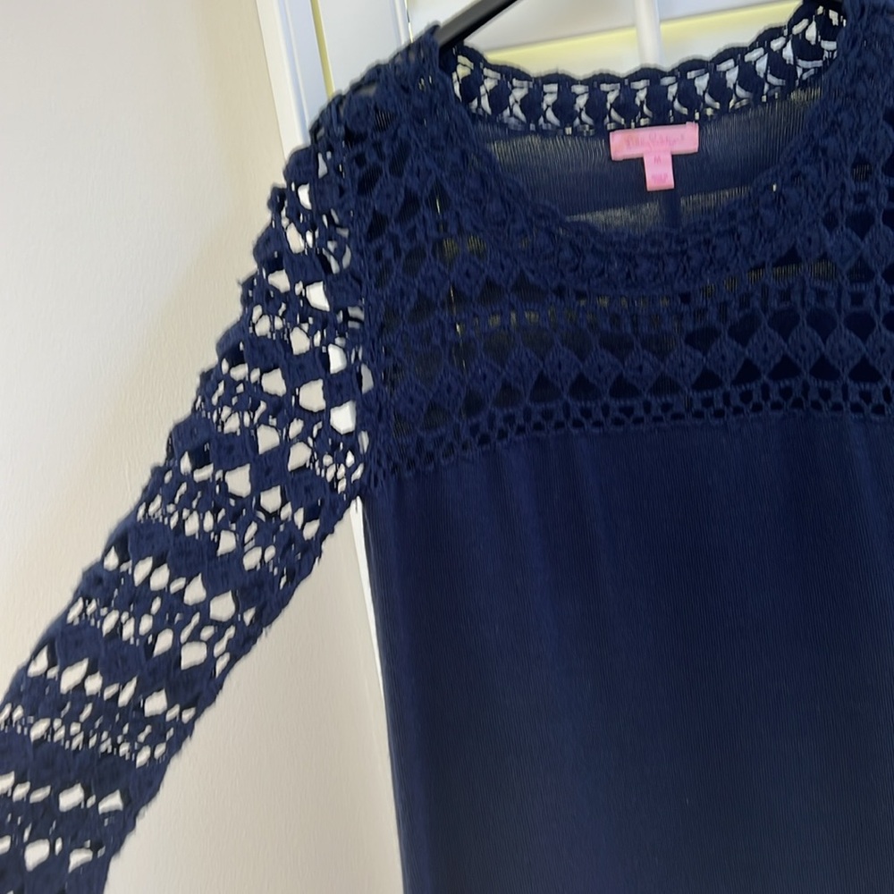 100% Marino wool Lily sweater dress with many details as seen in picture.